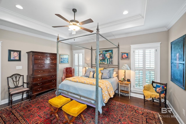 bedroom with ceiling fan, multiple windows, dark wood-type flooring, and crown molding