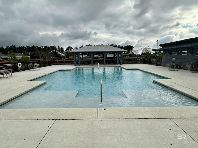1040 Hayward Loop, Foley, AL 36535 - community pool featuring a gazebo and a patio