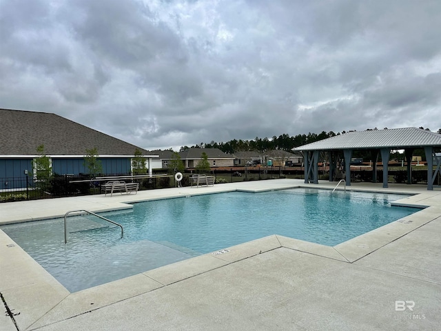 1040 Hayward Loop, Foley, AL 36535 - community pool featuring a gazebo and a patio