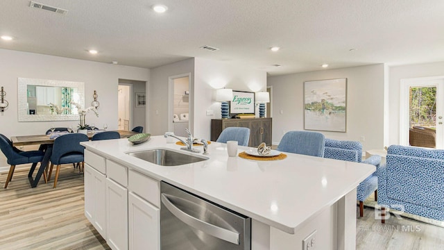 1040 Hayward Loop, Foley, AL 36535 - kitchen with dishwasher, open floor plan, light wood-style flooring, a center island with sink, and recessed lighting