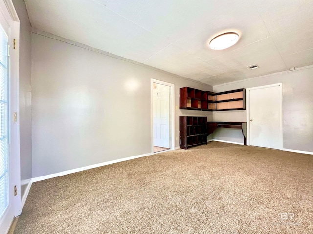 unfurnished bedroom featuring carpet flooring