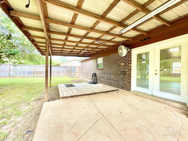 view of patio / terrace with french doors and fence
