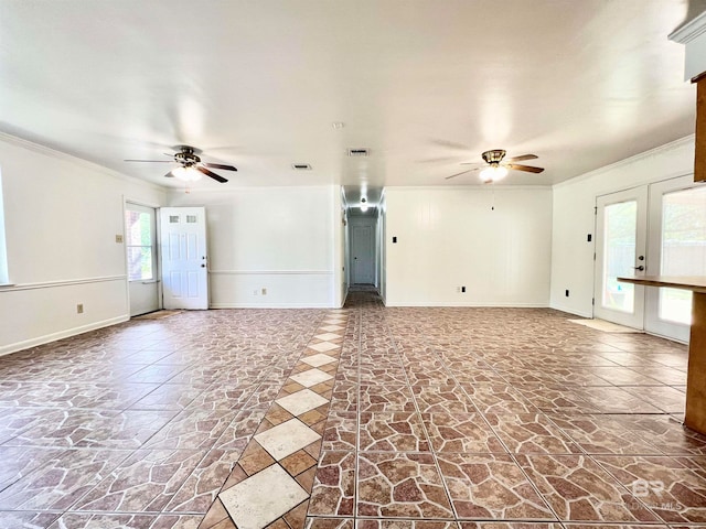 unfurnished living room featuring crown molding, ceiling fan, and french doors