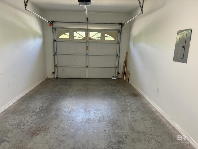 garage with electric panel and a garage door opener