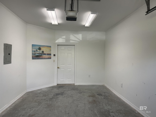 garage with electric panel and a garage door opener