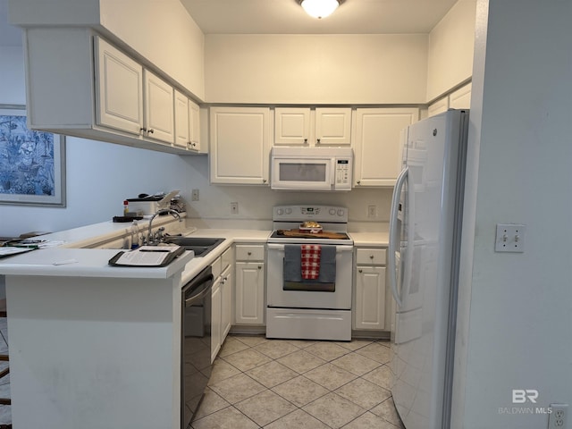 kitchen featuring kitchen peninsula, white appliances, sink, white cabinets, and light tile patterned flooring