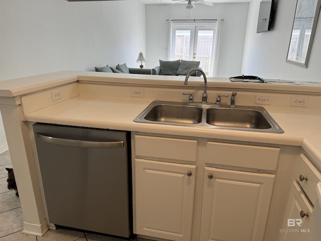 kitchen with ceiling fan, dishwasher, light tile patterned floors, and sink