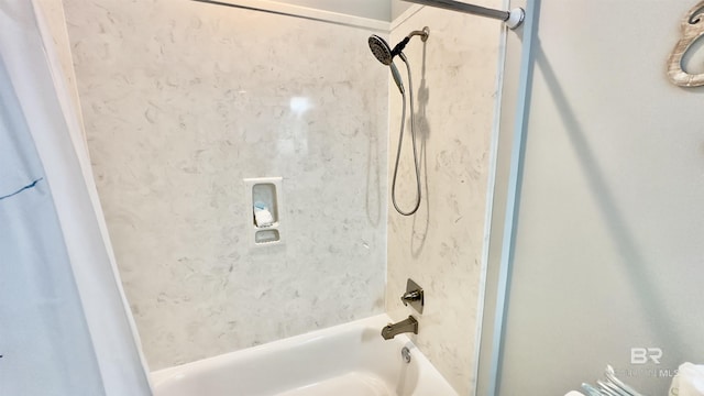 bathroom featuring toilet and shower / bathtub combination with curtain