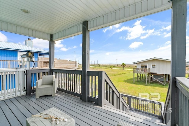 deck featuring a lawn