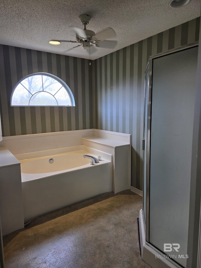 full bathroom featuring wallpapered walls, a shower stall, a textured ceiling, and carpet flooring