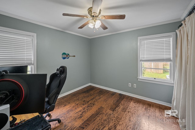 home office with baseboards, a ceiling fan, dark wood-type flooring, and crown molding