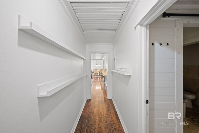 corridor with dark wood finished floors