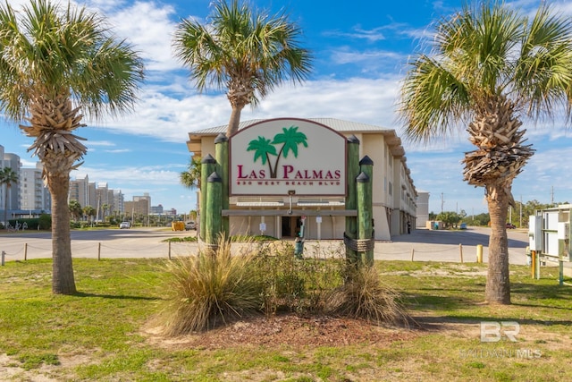 930 W Beach Blvd Unit 108, Gulf Shores, AL 36542 - community / neighborhood sign featuring a lawn