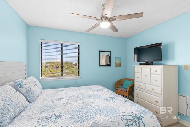930 W Beach Blvd Unit 108, Gulf Shores, AL 36542 - bedroom featuring a textured ceiling and ceiling fan