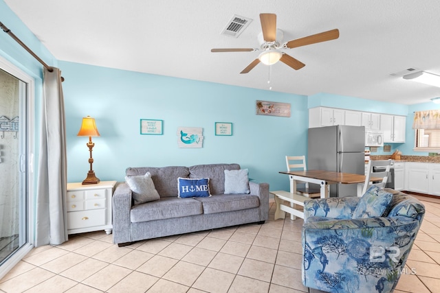 930 W Beach Blvd Unit 108, Gulf Shores, AL 36542 - living room featuring ceiling fan and light tile patterned flooring