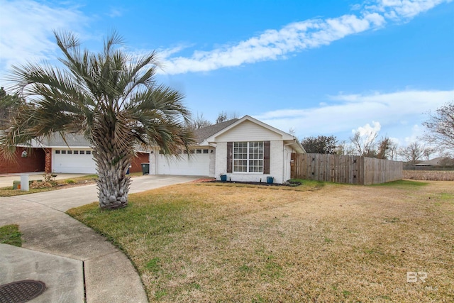 ranch-style home with a garage and a front yard