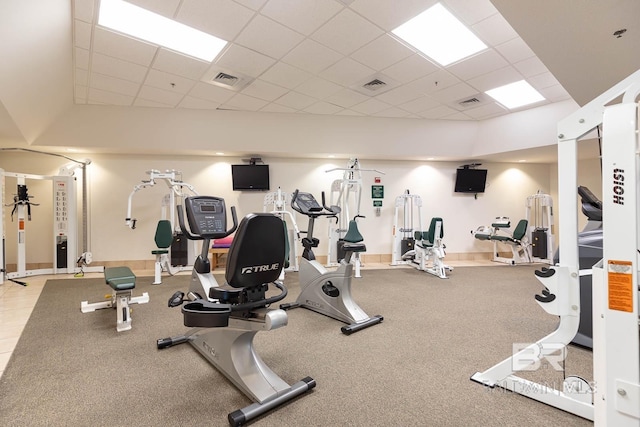 workout area featuring a drop ceiling