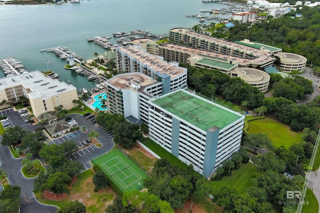 birds eye view of property with a water view