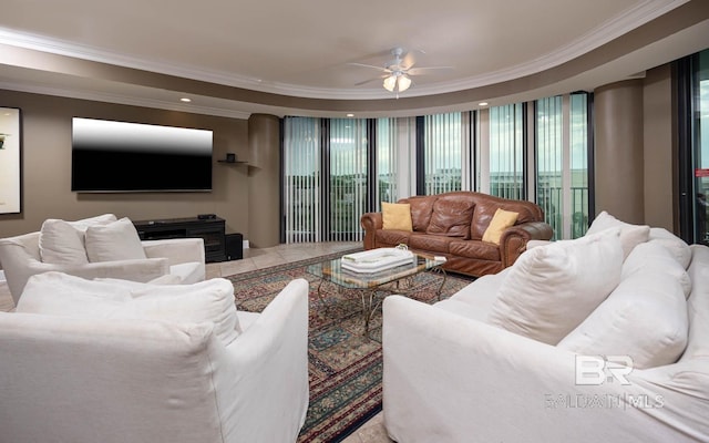 living room with ceiling fan and crown molding