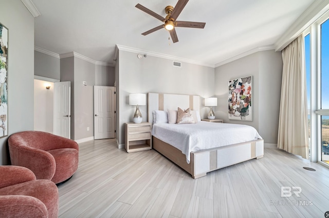825 W Beach Blvd Unit 10, Gulf Shores, AL 36542 - bedroom featuring ornamental molding, light wood finished floors, visible vents, and baseboards