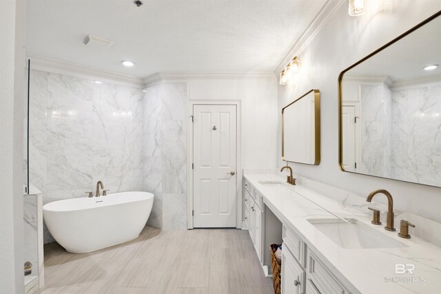 825 W Beach Blvd Unit 10, Gulf Shores, AL 36542 - full bath featuring crown molding, a soaking tub, a sink, and double vanity