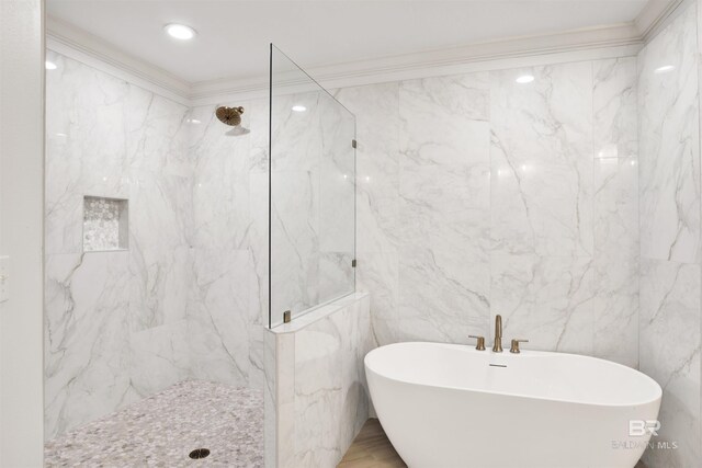 825 W Beach Blvd Unit 10, Gulf Shores, AL 36542 - full bathroom featuring ornamental molding, a soaking tub, and a marble finish shower