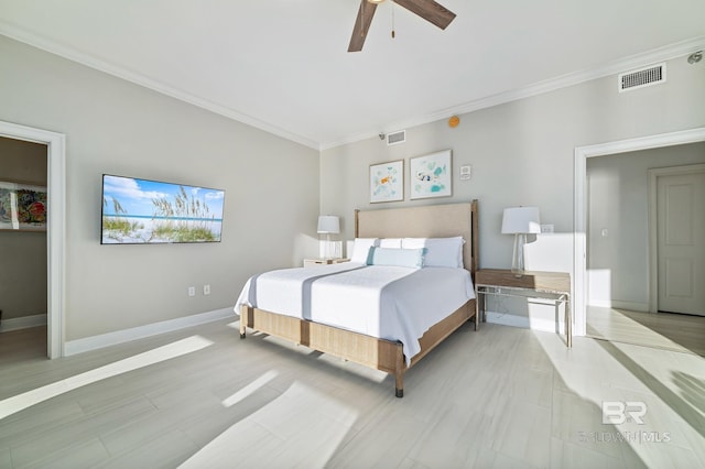 825 W Beach Blvd Unit 10, Gulf Shores, AL 36542 - bedroom with baseboards, visible vents, and ornamental molding