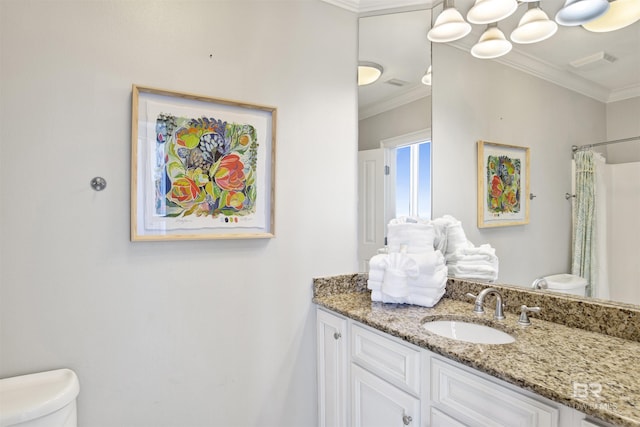 825 W Beach Blvd Unit 10, Gulf Shores, AL 36542 - full bath featuring toilet, vanity, visible vents, and ornamental molding