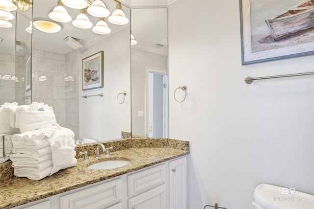 825 W Beach Blvd Unit 10, Gulf Shores, AL 36542 - full bathroom featuring ornamental molding, a tile shower, vanity, and toilet