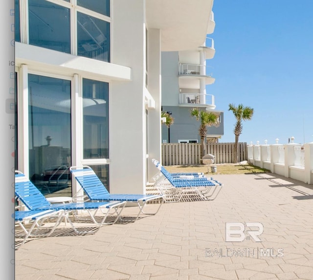 825 W Beach Blvd Unit 10, Gulf Shores, AL 36542 - view of patio with fence