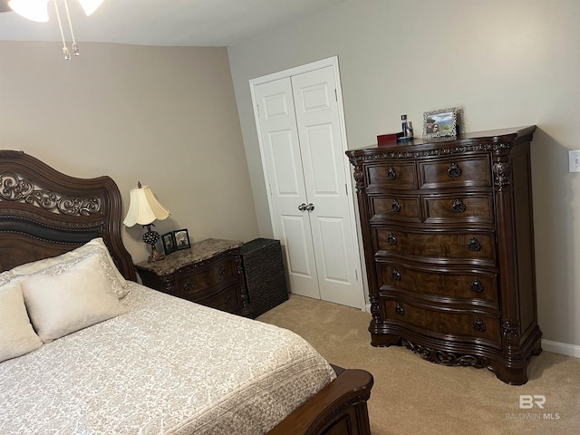 1517 Regency Rd Unit 161, Gulf Shores, AL 36542 - bedroom featuring light colored carpet and a closet