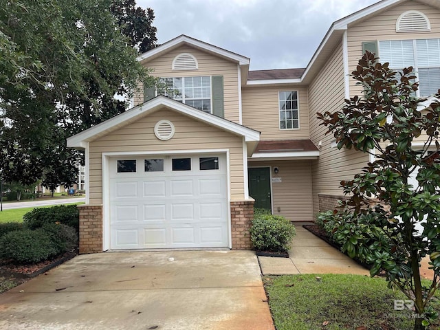 view of property featuring a garage