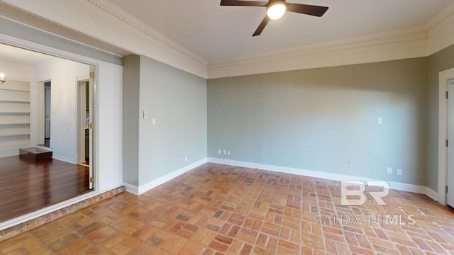 unfurnished room featuring crown molding and ceiling fan