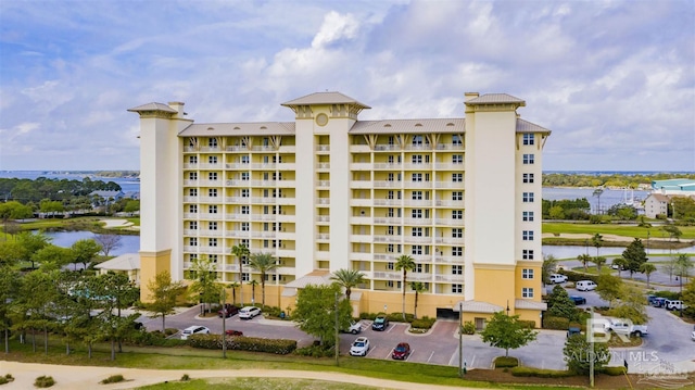 view of building exterior with a water view