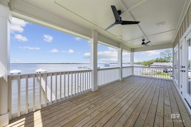 25995 W Perdido Ave, Orange Beach, AL 36561 - wooden terrace with a water view and ceiling fan