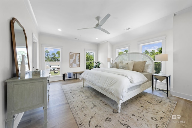 25995 W Perdido Ave, Orange Beach, AL 36561 - bedroom with recessed lighting, light wood-type flooring, and ceiling fan