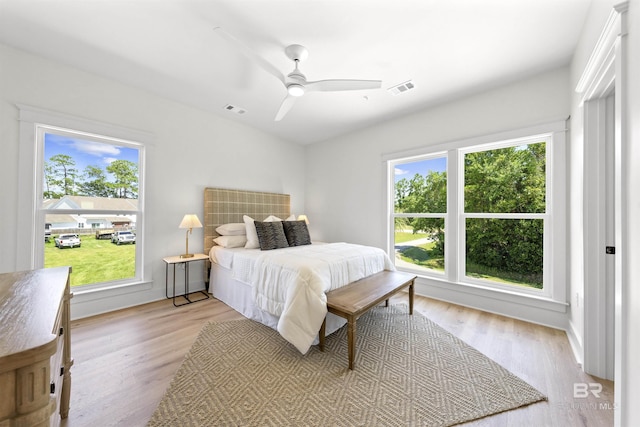 25995 W Perdido Ave, Orange Beach, AL 36561 - bedroom featuring light wood finished floors and a ceiling fan