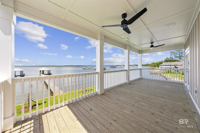 25995 W Perdido Ave, Orange Beach, AL 36561 - wooden terrace with a water view and ceiling fan