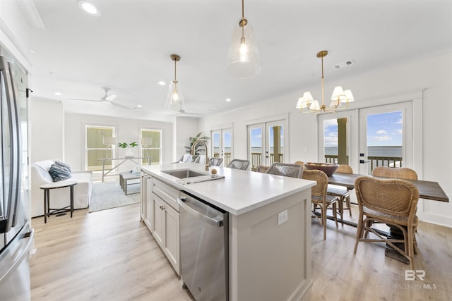 25995 W Perdido Ave, Orange Beach, AL 36561 - kitchen with appliances with stainless steel finishes, recessed lighting, plenty of natural light, and french doors