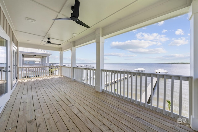 25995 W Perdido Ave, Orange Beach, AL 36561 - wooden terrace with a water view and ceiling fan