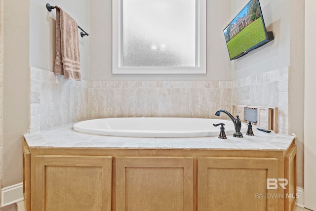 bathroom with a bathing tub