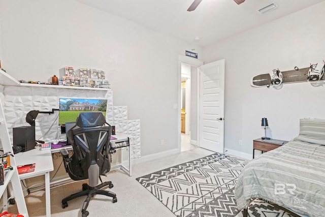 carpeted bedroom with ceiling fan