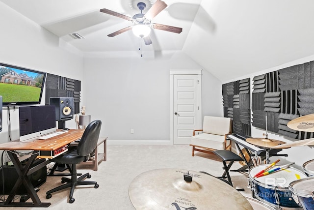 carpeted home office featuring ceiling fan and lofted ceiling