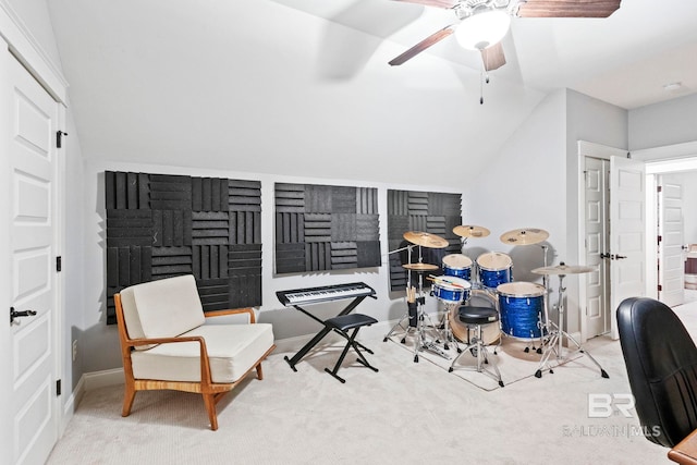 office with ceiling fan, light carpet, and vaulted ceiling