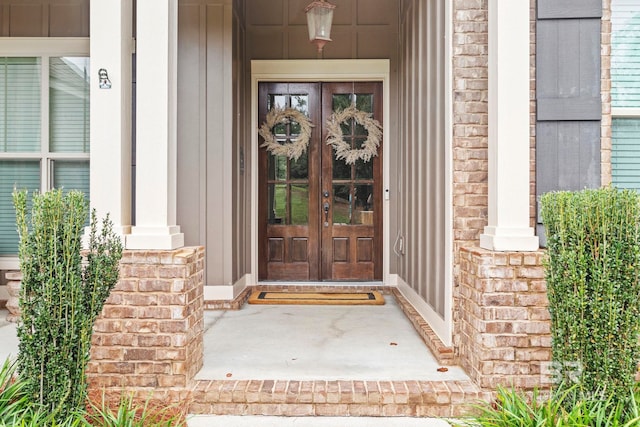 doorway to property featuring french doors