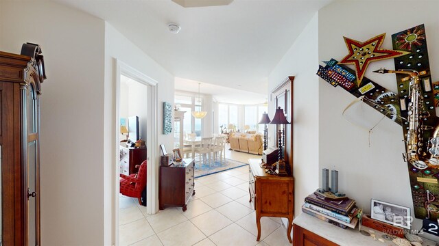 hallway with light tile patterned floors