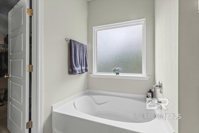 bathroom with a bath