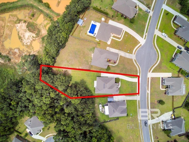 aerial view of residential area featuring property parcel outlined