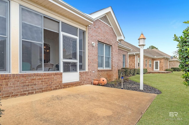 exterior space with a yard and a patio