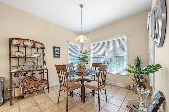 dining space with light tile patterned floors